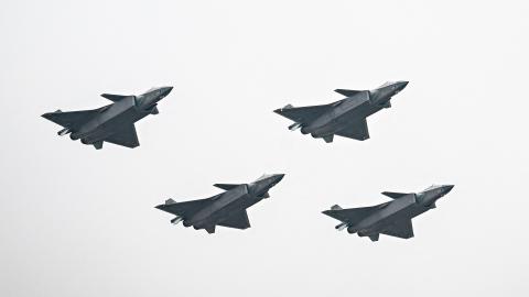 Chinese J-20 stealth fighters of the People's Liberation Army (PLA) perform at the Airshow China 2022 in Zhuhai in southern China's Guangdong province on November 8, 2022. - China OUT (Photo by CNS / AFP) / China OUT (Photo by -/CNS/AFP via Getty Images)