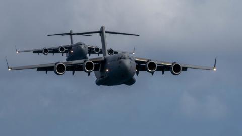 A Royal Australian Air Force C-17 Globemaster III flies in front of a U.S. C-17 during an aerial maneuver training mission around the Hawaiian islands as part of Exercise Global Dexterity 2022 at Joint Base Pearl Harbor-Hickam, Hawaii, May 4, 2022. The RAAF and USAF conducted joint flying missions alongside each other and swapped aircrew members to better learn of each others’ procedures and techniques. (U.S. Air Force photo by Airman 1st Class Makensie Cooper)