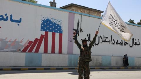 Members of Taliban led government, as well as many Afghan men participate in celebrations marking the 1st anniversary of the US-led troops' withdrawal from the country in Kabul, Afghanistan on August 31, 2022. (Photo by Bilal Guler/Anadolu Agency via Getty Images)