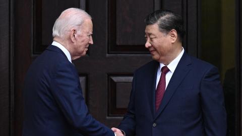 President Joe Biden greets President Xi Jinping before a meeting in Woodside, California, on November 15, 2023. (Brendan Smialowski/AFP via Getty Images)