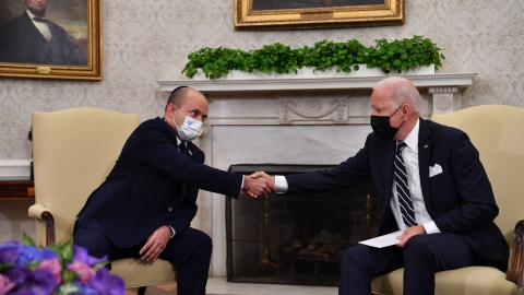 US President Joe Biden shakes hands with Israeli Prime Minister Naftali Bennett in the Oval Office of the White House in Washington, DC, on August 27, 2021. (Photo by Nicholas Kamm/AFP via Getty Images)