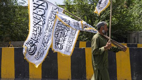 An Afghan man sells Taliban flags in Kabul, Afghanistan, on August 13, 2024. (Wakil Kohsar/AFP via Getty Images)