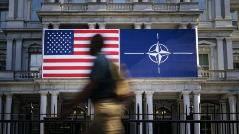 The US and NATO flags hang on a building in Washington, DC, on July 9, 2024. (Thomas Trutschel/Photothek via Getty Images)