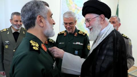 Iranian Supreme Leader Ayatollah Ali Khamenei awards the Order of Fat'h to Amir Ali Hajizadeh in Tehran, Iran, on October 6, 2024. (Iranian Leader Press Office/Anadolu via Getty Images)