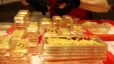 Gold bars are on display at a gold jewelry store on October 18, 2024, in Hangzhou, China. (Ni Lifang/VCG via Getty Images)