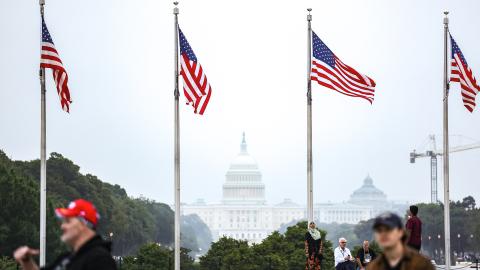 US flags fly in front of the White House on October 3, 2024. (Valerie Plesch/picture alliance via Getty Images)