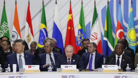 Vladimir Putin and Xi Jinping attend a plenary session at the BRICS summit in Kazan, Russia, on October 24, 2024. (Maxim Shemetov/AFP via Getty Images)