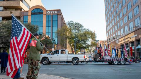 Veterans ride on floats in the Austin Veterans Parade Celebration on November 11, 2024, in Austin, Texas. (Brandon Bell via Getty Images)