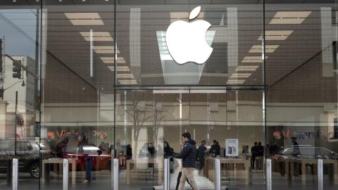 The Apple logo hangs in front of an Apple store on March 21, 2024, in Chicago, Illinois. (Scott Olson via Getty Images)