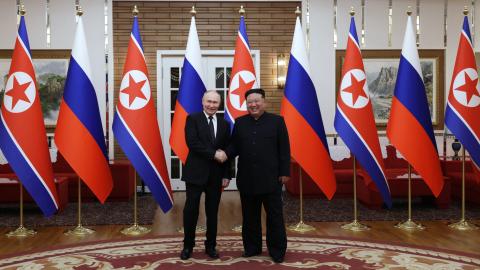 Russia's President Vladimir Putin shakes hands with North Korea's leader Kim Jong Un during a meeting in Pyongyang, North Korea, on June 19, 2024. (Gavriil Grigorov/AFP via Getty Images)